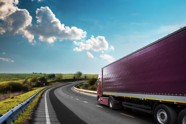 Arriving white truck on the road in a rural landscape at sunset _ Premium Photo Transporte Cerdanyola contacto
